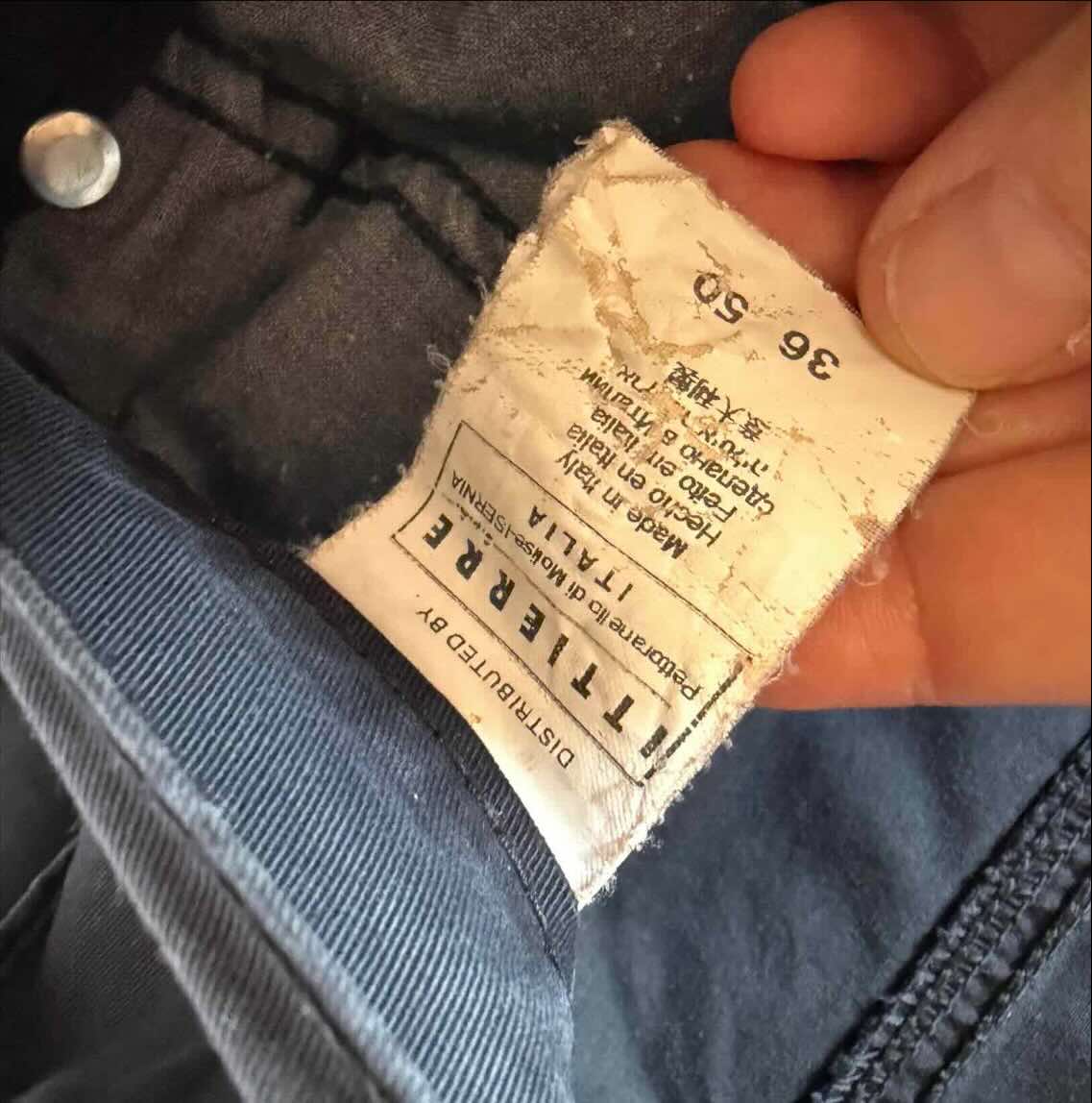 Etichetta interna pantaloni Versace Jeans Couture