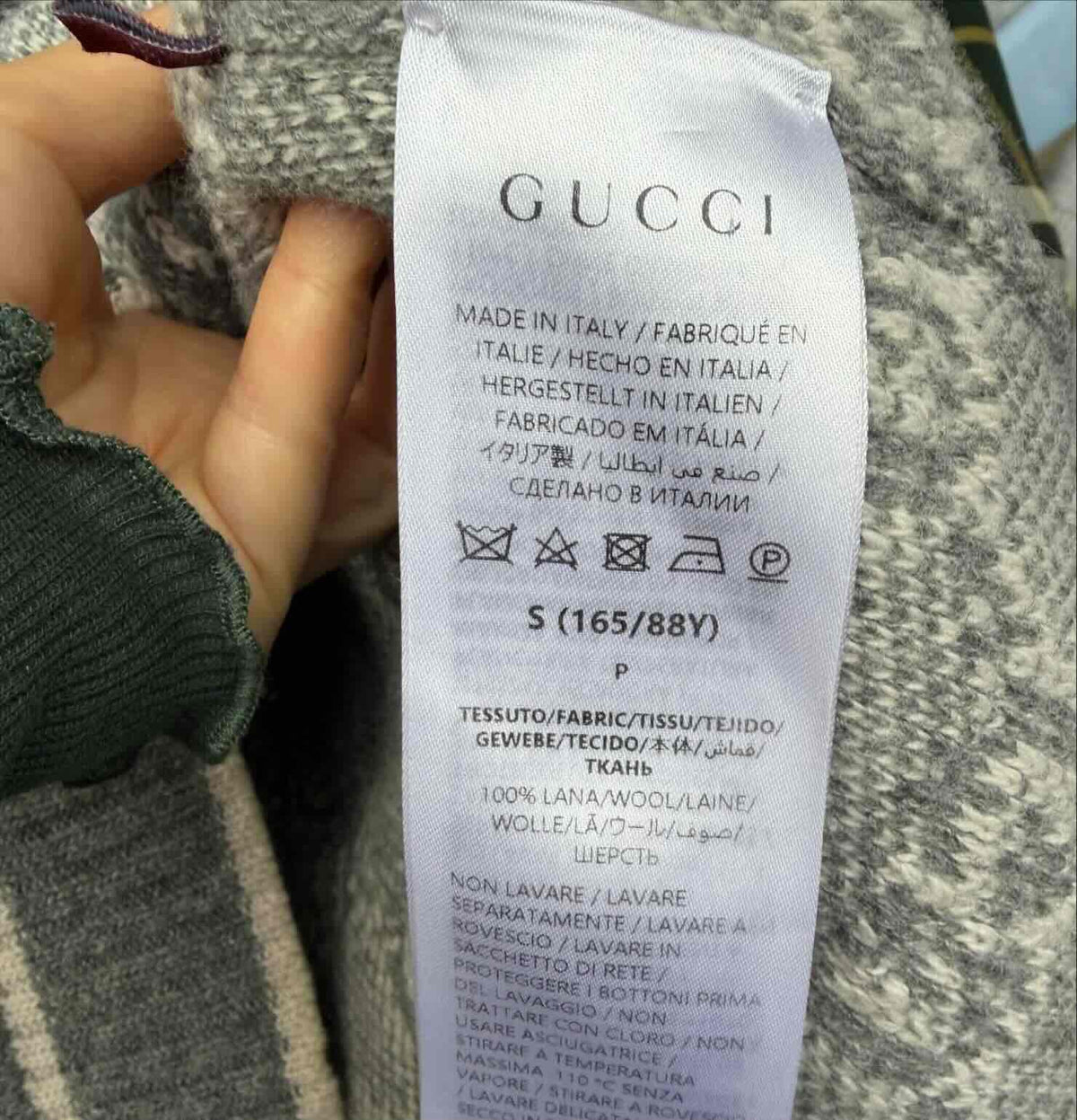 Etichetta interna cardigan in lana di Gucci 