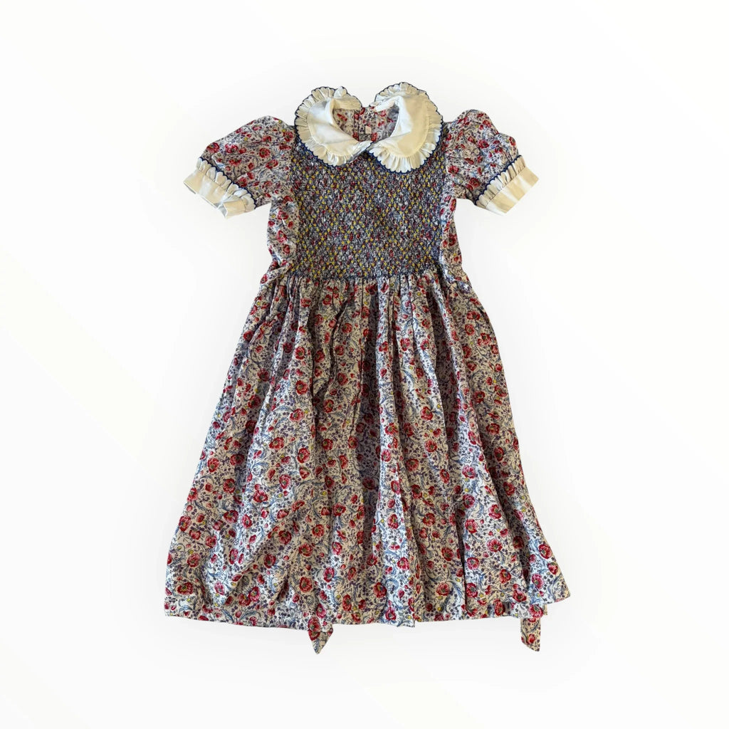 Vestito vintage fiorato da bambina. Con ricami