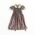 Vestito vintage fiorato da bambina. Con ricami