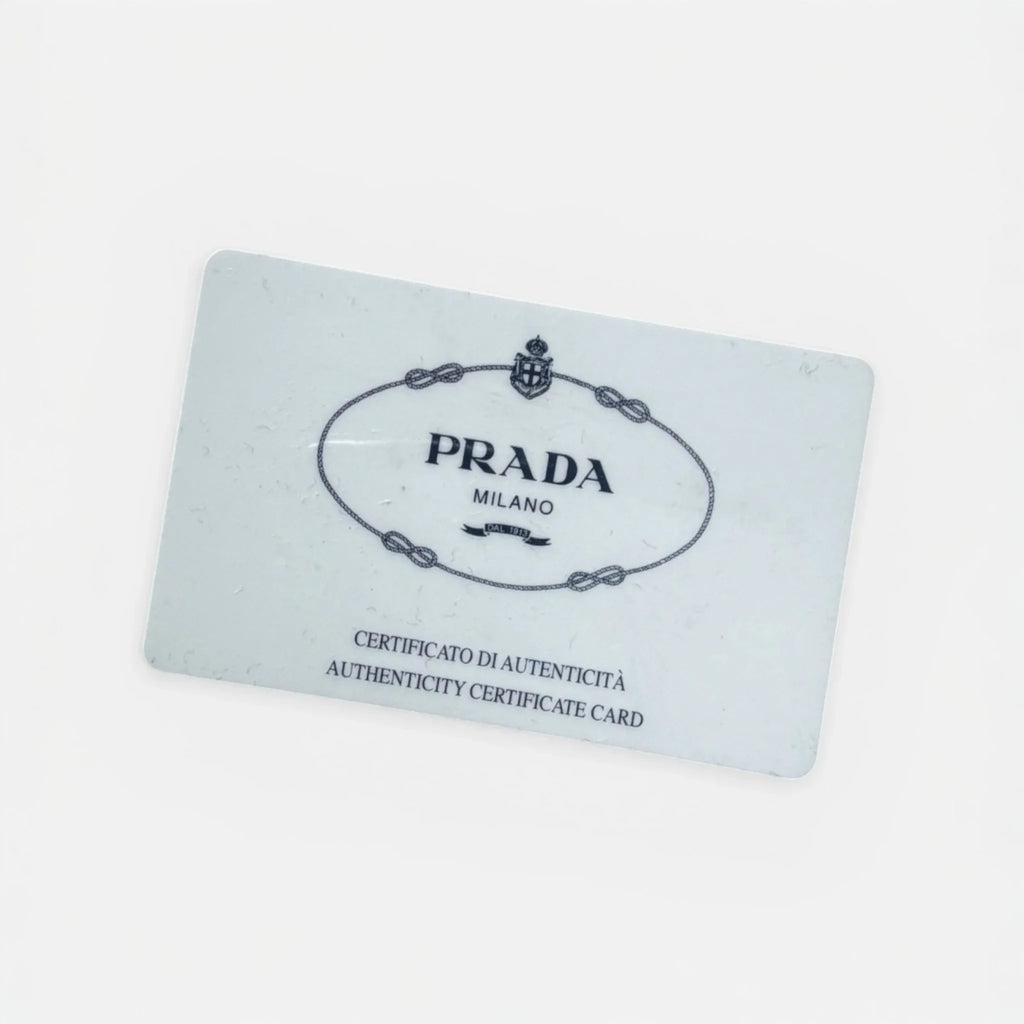 certificato di autenticità di Prada per zainetto in tela nero